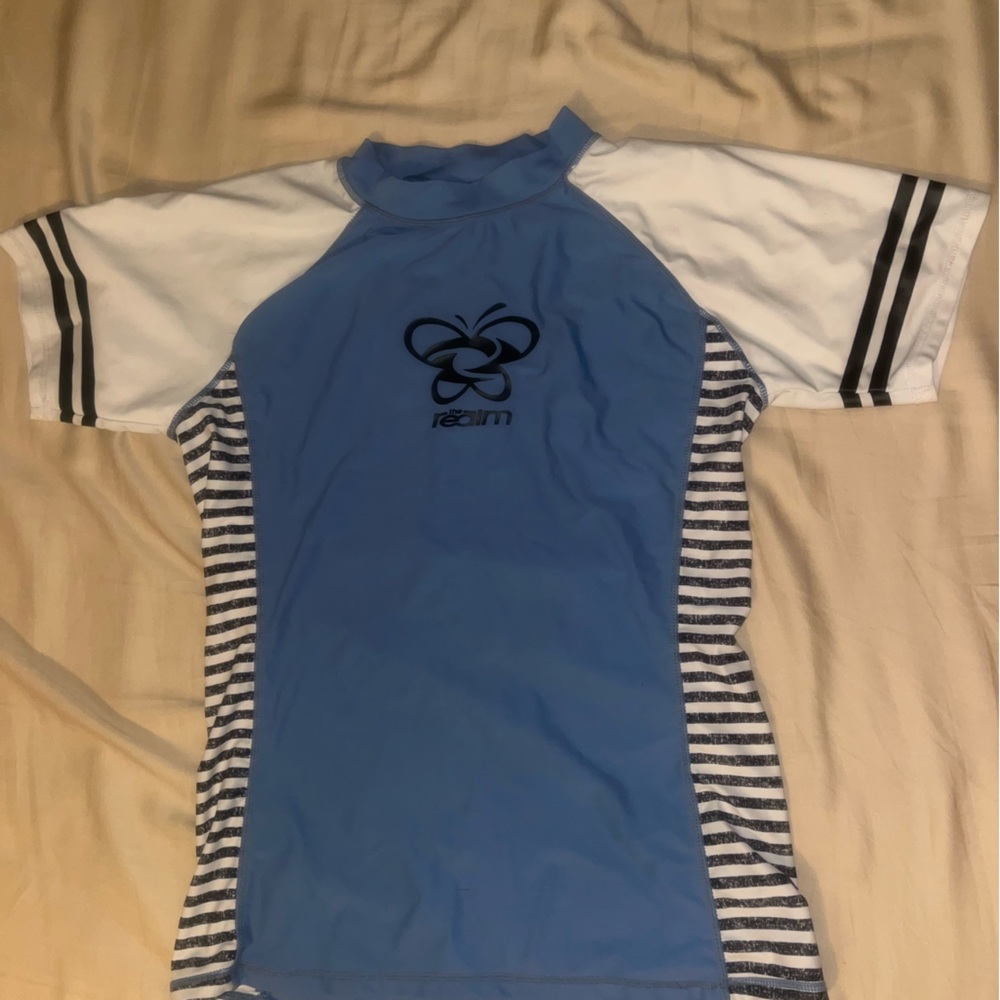 Woman’s swimming shirt.